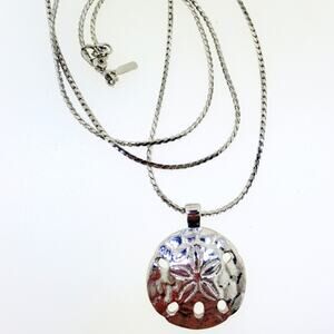 Silver sand dollar pendant on 24" silver chain